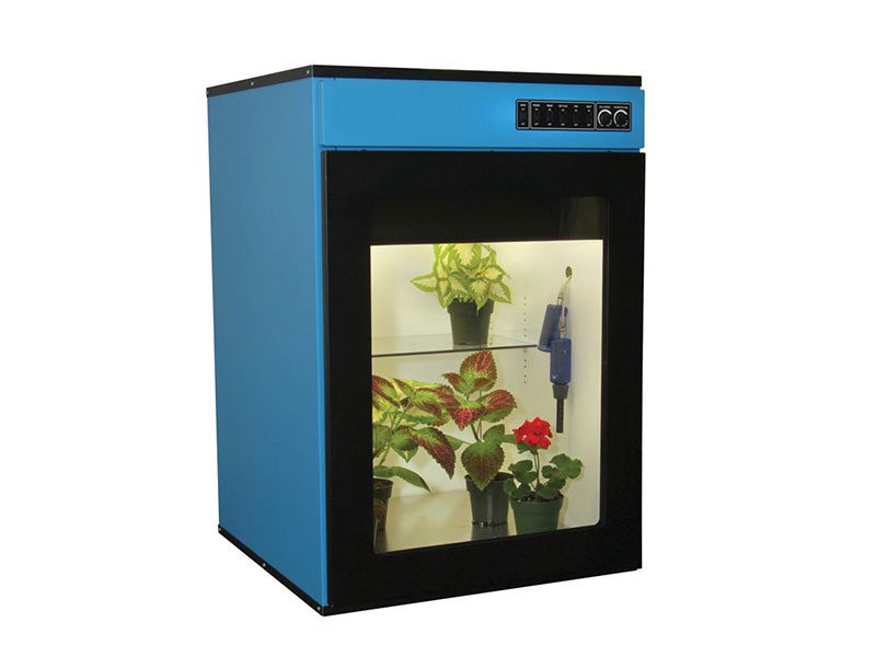 blue metal environmental chamber with plants inside